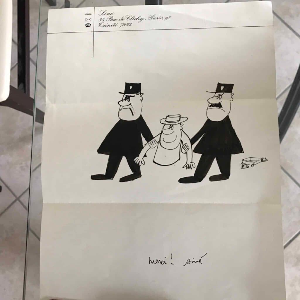 Dibujo de Siné en hoja de papel A4