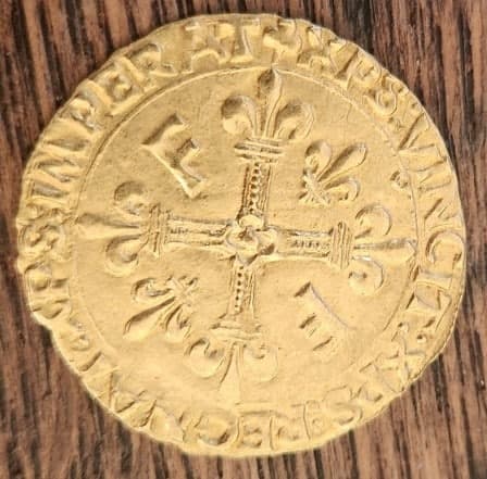 Tasación del precio de un Écu de oro al sol de Francisco I, especificando el lugar de acuñación y el tipo.